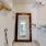 large walk in closet with a stand up mirror and plenty of hanging and shelving space