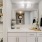 a bathroom with a large mirror