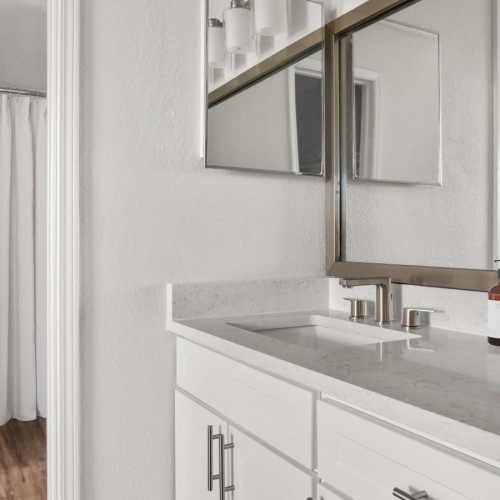 a bathroom with a large mirror