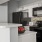 a kitchen with white cabinets