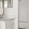 a bathroom with a shower and mirror