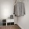 large closet with clothes hanging and additional storage set up