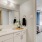 a bathroom with a large mirror