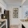 a kitchen with white cabinets